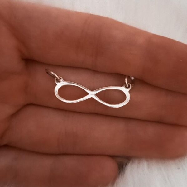 Dije de plata infinito
