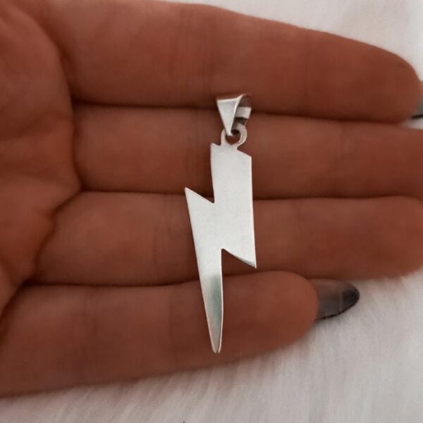 Dije de plata Rayo