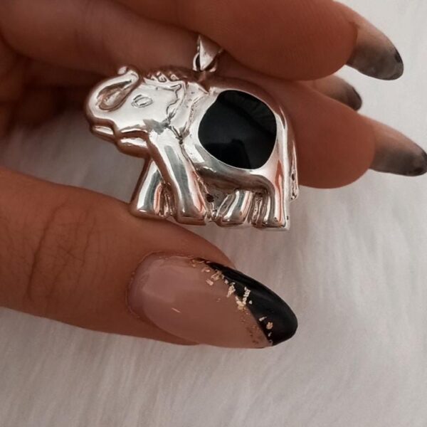 Dije de plata y onix elefante