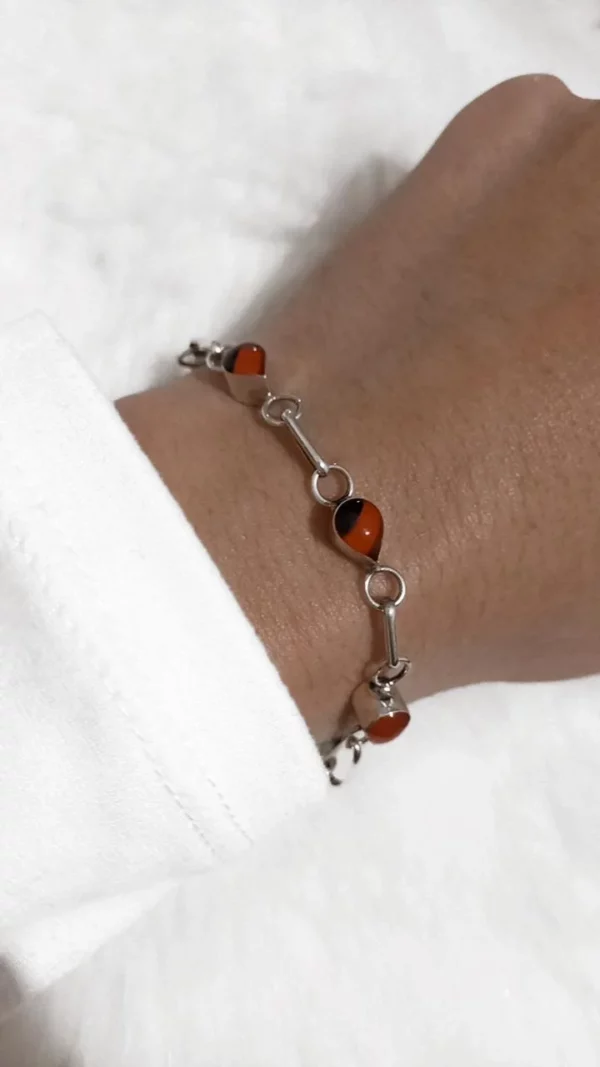 Roma con Semilla de Huayruro