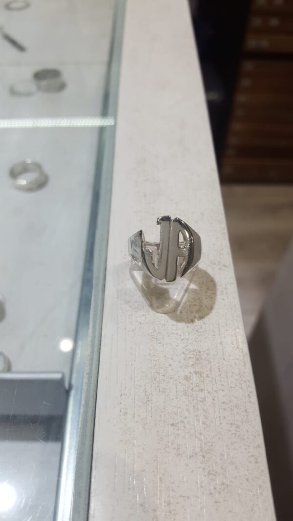 Inicial oval doble