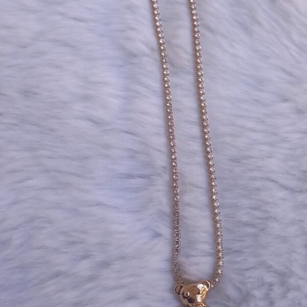 Conjunto micro cristal oso dorado