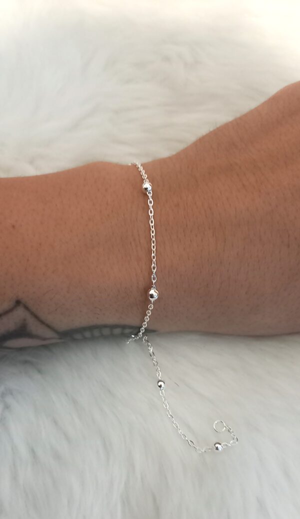 Bolita con cadena