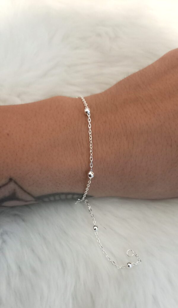 Bolita con cadena