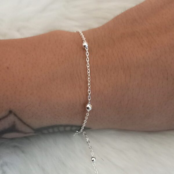 Bolita con cadena