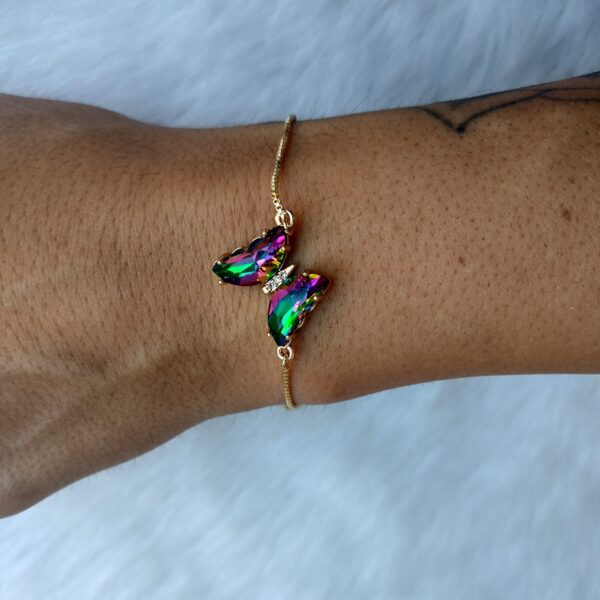 Mariposa violeta/verde