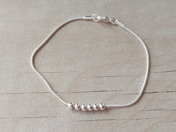 Pulsera bolitas x6