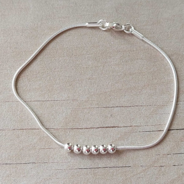Pulsera bolitas x6